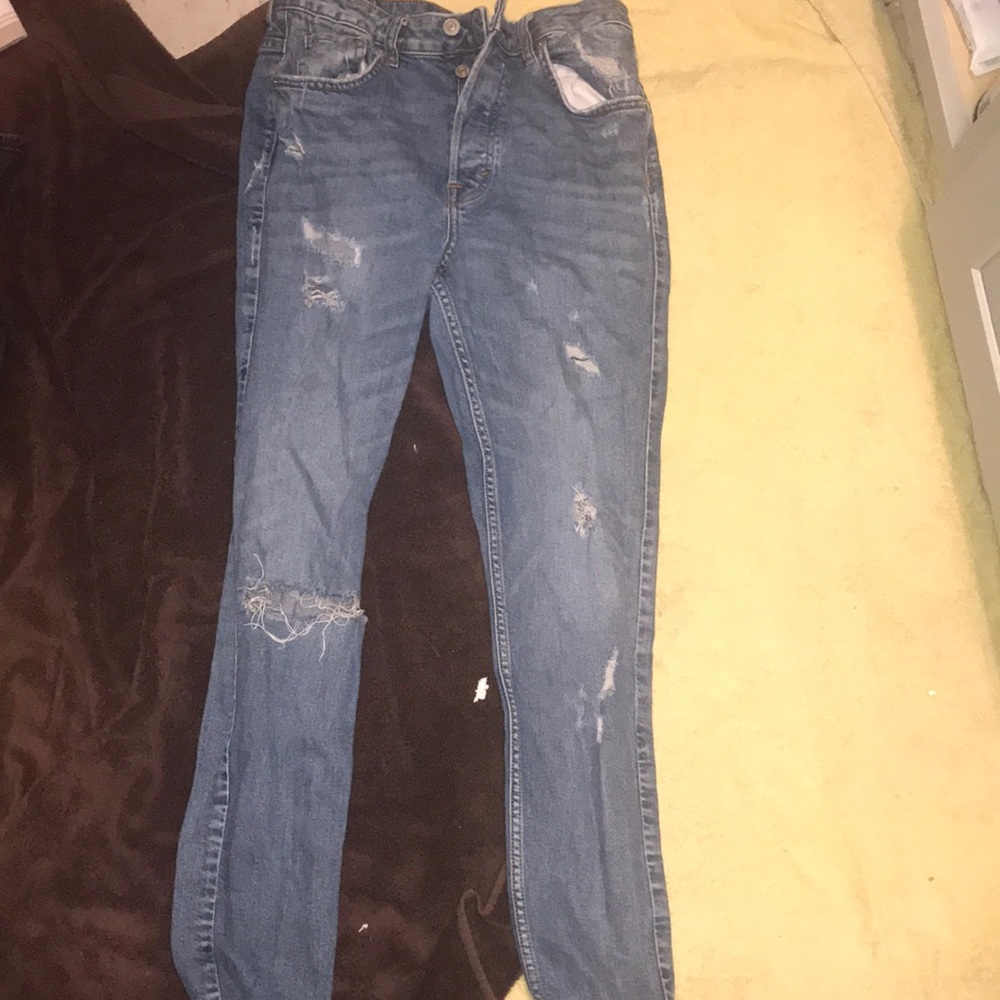 Blue distressed jeans